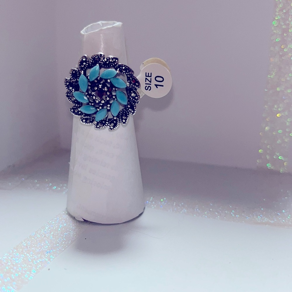 Bohemian style Silver toned and turquoise stones with black cz crystals.